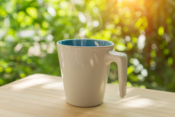 Obraz premium White coffee cup in the morning time