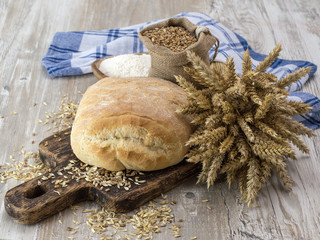 Homemade Italian bread on a wooden board. 