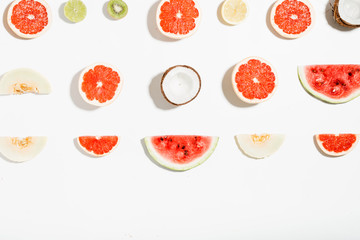 Creative layout pineapple, watermelon, coconut, melon, grapefruit, lemon, lime, kiwi