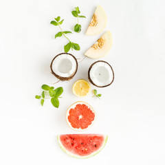 Creative layout made coconut, grapefruit, watermelon, whole, lemon and mint