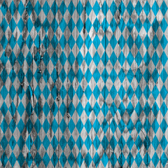 Oktoberfest bavarian traditional blue and rhombus background pattern. Wood texture.