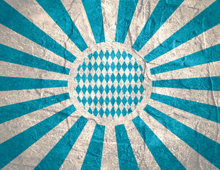 Oktoberfest bavarian traditional blue and rhombus background pattern. Blue radial sun rays. Grunge distress texture.