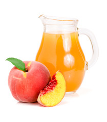 Peach juice in a glass jug isolated on white background