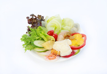 Fresh vegetable salad isolated on white.