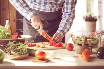 male cooking healthy salad