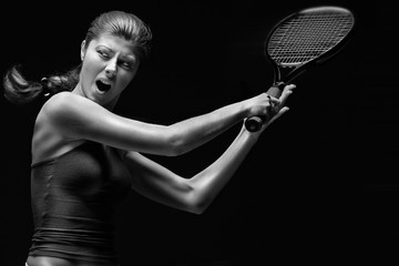 Ready to hit / A portrait of a tennis player with a racket.