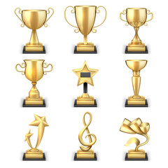 Realistic golden trophy cups and sports awards vector set