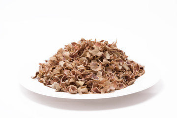 Dry Bael Fruit tea (Aegle marmelos) isolated on white background