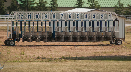 The starting gates at the racetrack, Sunny day