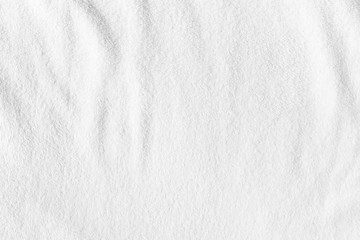 White towel texture for background. That fabric or textile consist of cotton fiber material. Look plush, fluffy, dry, soft and clean. For background about baby, spa, hotel, laundry and hygiene etc.