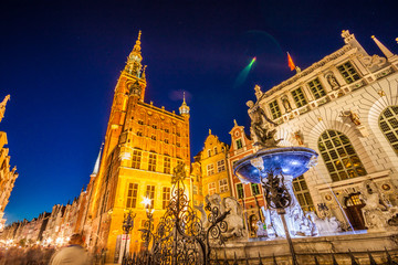 Beautifully illuminated Old Town in Gdansk with Neptune's statue. Poland © cone88