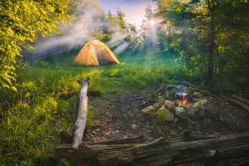 Travel tent in a light of sunrise