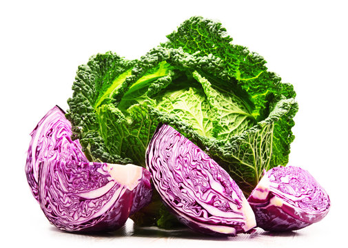 Fresh organic cabbage heads isolated on white