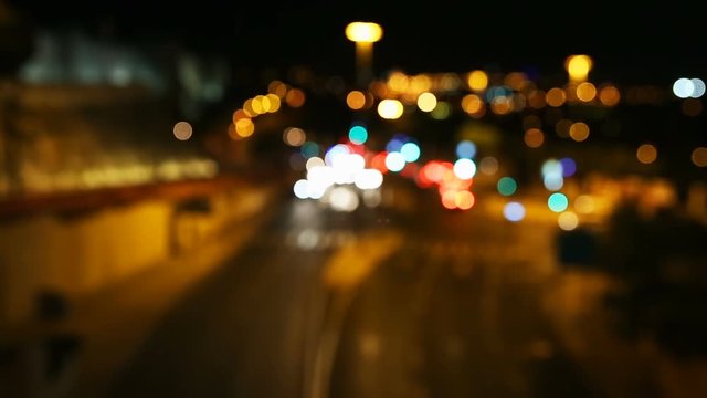 Defocused cars traffic at night in Jerusalem