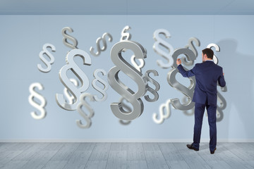 Businessman using law interface on a wall 3D rendering