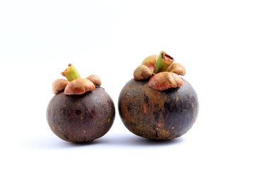 Fresh  Mangosteen isolated on white background. Tropical fruit.