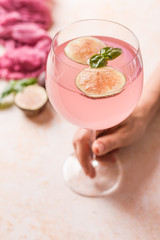Pink cocktail with fig