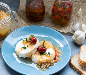 Cheese with white mold Hermelin with onion and hot pepper. Delicious snack