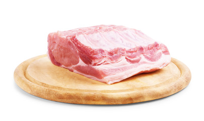 Raw beef on cutting board isolated on white background