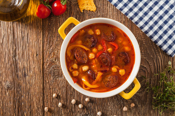 Traditional chickpea soup with paprika and chorizo sausage.