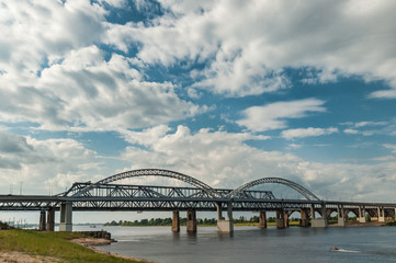 cable bridge on the backdrop of the setting sun
