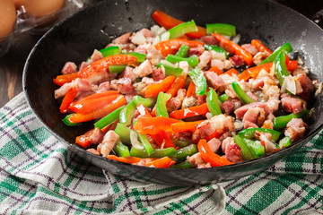 Frieding ingredients for preparing omelette