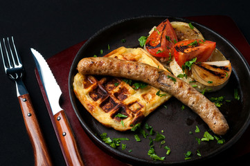 juicy sausage grill on a beautiful pan with vegetables
