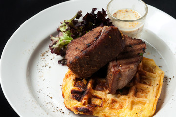 Pork steak with vegetables and garnish

