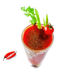 Glass of bloody mary isolated on a white background. Delicious alcohol cocktail made of tomato juice, vodka, pepper, salt, lemon juice, celery and other flavorings. © Maxim Khytra