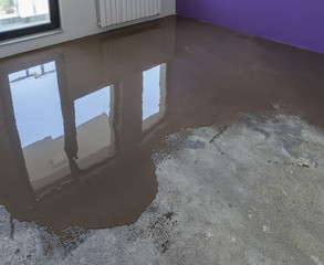 Floor covering with self leveling cement mortar. Mirror smooth s