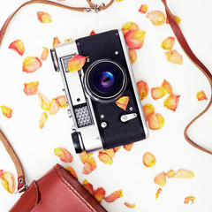Old retro camera on white background. Abstract background