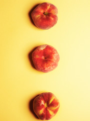 Flat lay. Top view. Peaches on a bright background