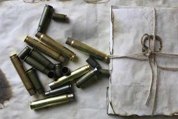 bullet and retro paper on the table