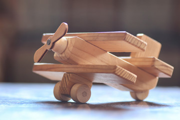 wooden toy airplane on the table