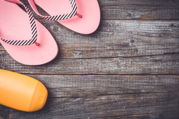 Summer accessories on an old wooden table
