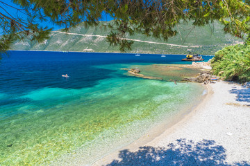 Fototapeta na wymiar Little beach in Vasiliki town, Lefkada island, Greece.