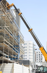 Fototapeta premium Construction of a new residential quarter and office buildings 