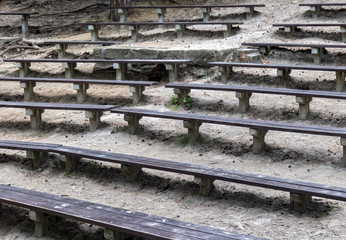 The rows of wooden bench, forest natural theater