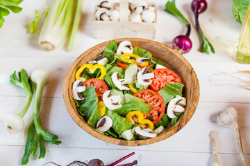 Fototapeta na wymiar vegetable salad bowl on kitchen table, balanced diet