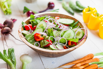 vegetable salad bowl on kitchen table, balanced diet