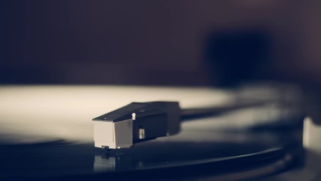 Record player turntable 4k stock footage. A record player turntable with it's stylus running along a vinyl record