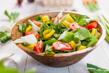 vegetable salad bowl on kitchen table, balanced diet