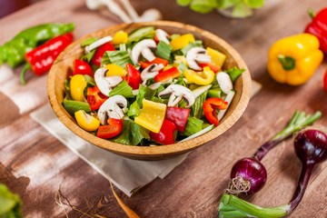 vegetable salad bowl on kitchen table, balanced diet