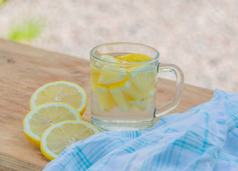 on the table a cool drink lemon water.