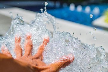 Fototapeta premium Hand with water splash