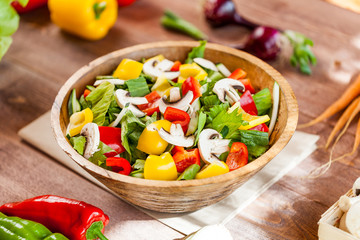 vegetable salad bowl on kitchen table, balanced diet