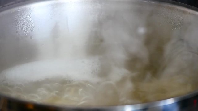 Close up boiling water  while high-temperature.