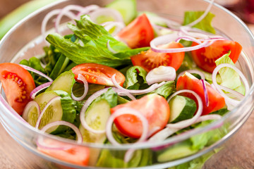 vegetable salad bowl on kitchen table, balanced diet
