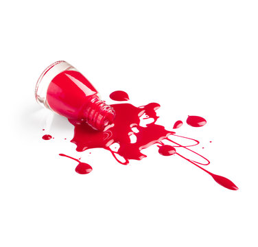 Spilled red nail polish isolated on white background
