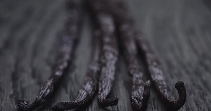 bourbon vanilla pod on oak table